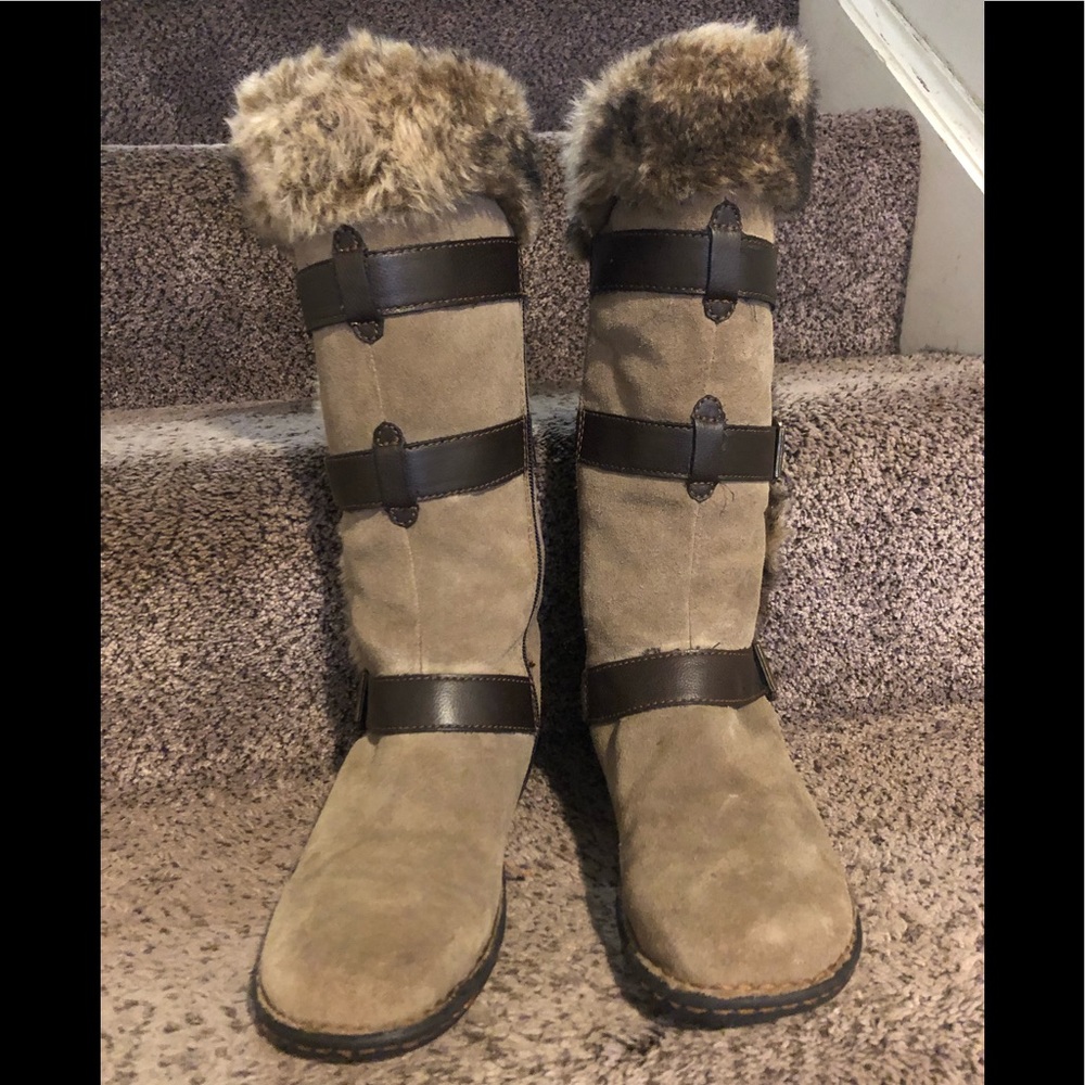 Tan and brown suede boots with leather accents.